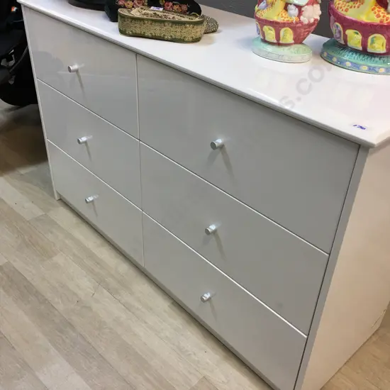 White Lacquered Six Drawer Lowboy With Silver Coloured Knobs H72,W114,D40cm.